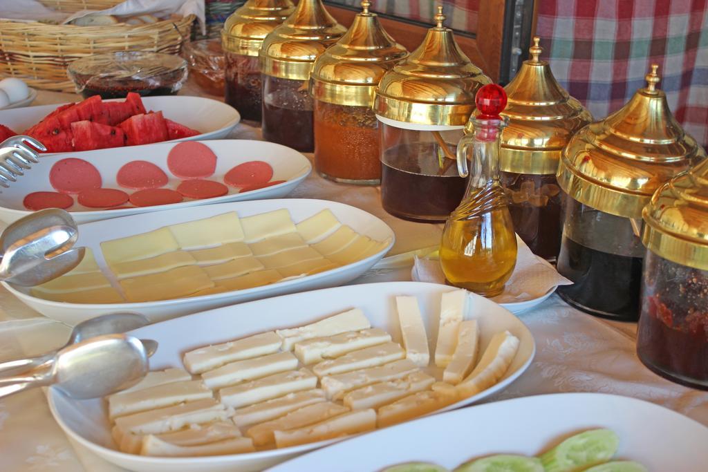 بوزجادا Ilyada Hotel الغرفة الصورة